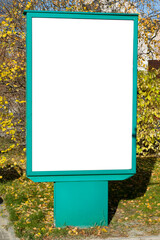 Empty Billboard with space for text, advertising on the street  in the city in autumn