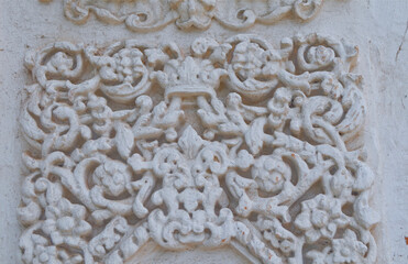Decorative patterns on a stone slab