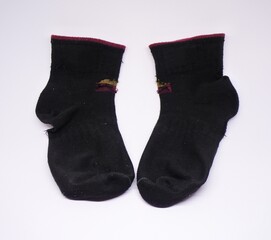 used socks on white background
