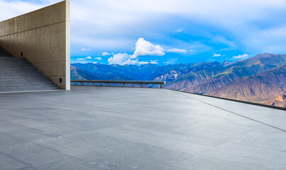 Obraz premium Empty square floor and mountain with sky clouds landscape.