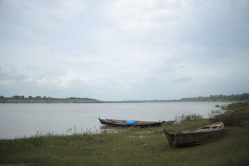 Obraz premium Tropical Seascape with a wooden boat.