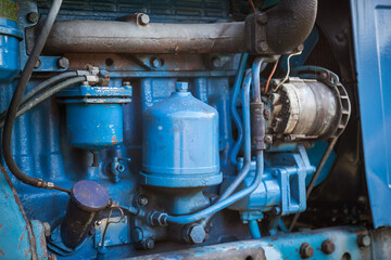A closer look at an old tractor engine.