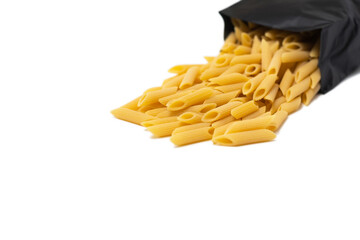 pasta close-up on a white background. Pasta spilled out of the package.