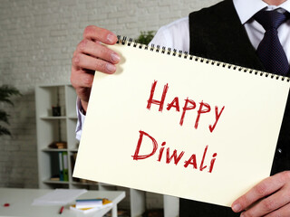 Financial concept about Happy Diwali with sign on the page.