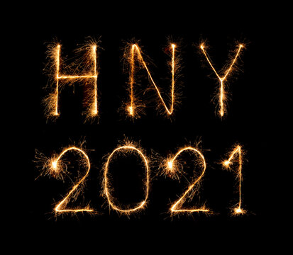 2021 happy new year fireworks written sparklers at night