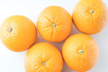 fresh oranges in a transparent plastic bag