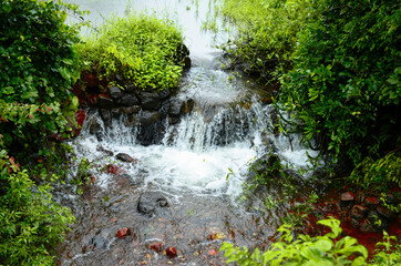 Water flowing through rocks during rainy season