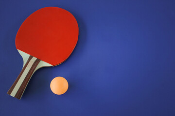 ping pong racket and ball