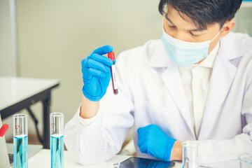 Scientist covid-19 virus chemistry  research experiment biotech antibody sample laboratory...
