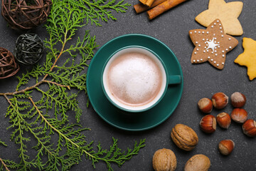 Christmas composition with tasty cocoa drink on table