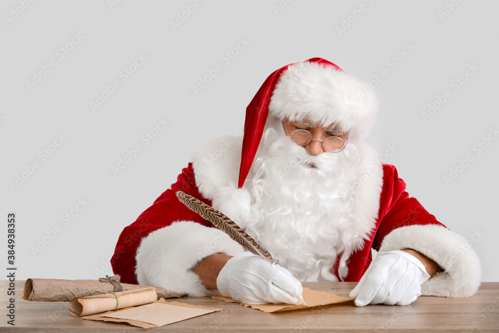 Sticker Santa Claus making wish list on light background