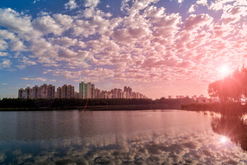 The skyline of waterfront city under the background of sunrise