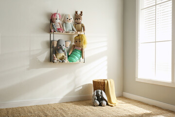 Many cute toys indoors. Baby room interior elements