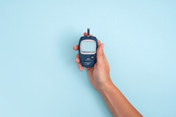 Healthy lifestyle concept. Health care. Medical diabetes meter equipment. Top view of glucose blood...
