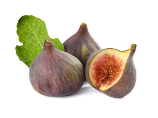 Tasty whole and cut figs with green leaf isolated on white