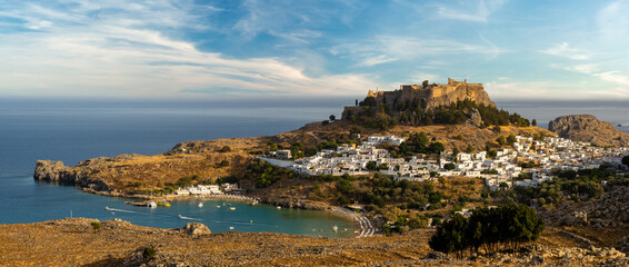 panoramic view of Lindos bay, village, fortress and Acropolis, Rhodes, Greece