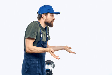 Worker man uniform delivery service emotions studio light background