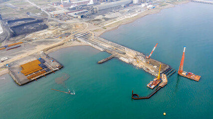 Aeriel view of the under construction new pier and harbor.