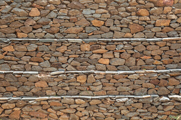 Stone texture on wall in Dungur palace of Queen Sheba, Aksum, Ethiopia. Graphic background or backdrop for grunge use