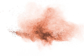 Brown powder explosion on white background.