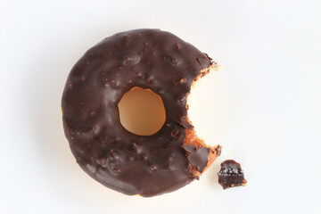 eaten chocolate donut on white background.