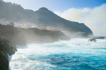 Ocean bathes lava pools Madeira