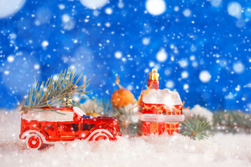 Christmas or New Year card. Christmas toy in a snowy background. Holiday banner.