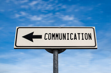 Communication road sign, arrow on blue sky background. One way blank road sign with copy space. Arrow on a pole pointing in one direction.
