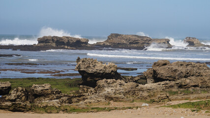 Rocky seashore with rough high tide and large waves, Essaouira, Morocco