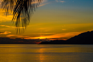 Sunset over the sea at Perhentian Island, Malaysia