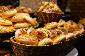 A large pile of bread in the basket