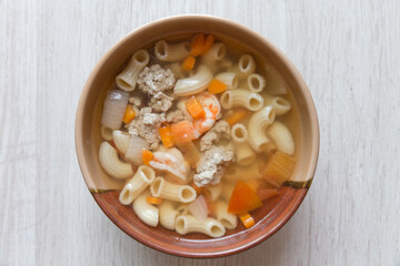 Asian macaroni soup with shrimp and chop pork