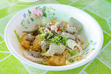 Asian spicy noodle with chopped pork