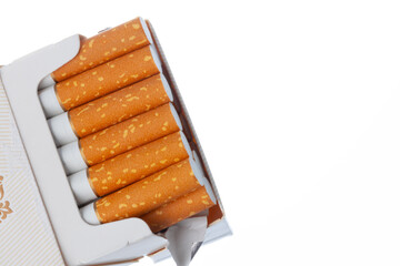 Opened new pack of cigarettes isolated on white