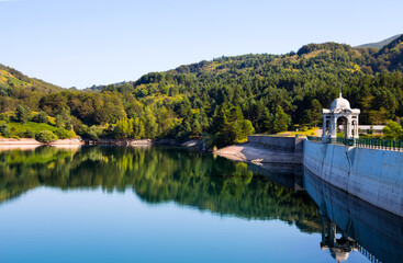 Fototapeta premium Giacopiane lake is an artificial reservoir located in the Sturla valley in the municipality of Borzonasca, inland of Chiavari, Genoa province, Italy