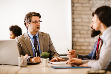 Meeting with agent in office, buying renting apartment or house, buyers of real estate ready to conclude a deal.