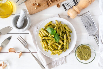Step by step preparing italian pesto sauce. Step 9 - adding pesto to pasta
