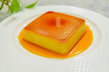 Closeup of Caramel Bread Pudding with caramalized sugar sauce - Beautiful & Sweet Dessert Dish