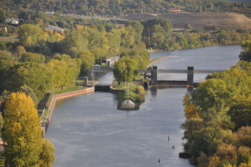 view over the river Main and the lock from the vineyards above Randersacker on an autumn sunny day,...