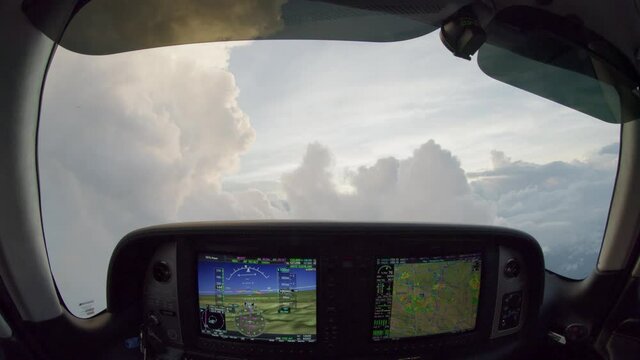 Fisheye looking out front window of airplane in flight