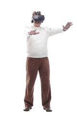adult male looking with interest through virtual reality glasses