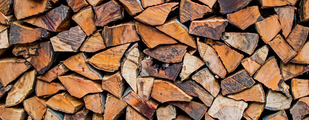 wood chopped and arranged. Wood for the cold season