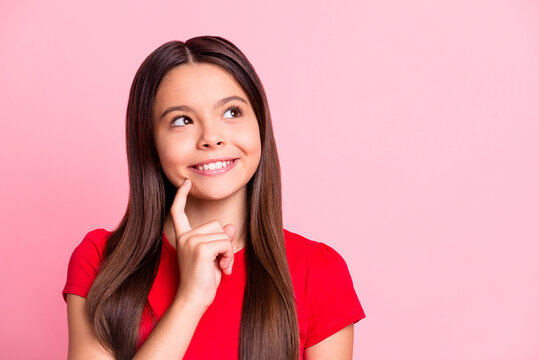 Photo Of Inspired Kid Hispanic Girl Think Look Copyspace Isolated Over Pastel Color Background