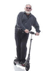 Fototapeta na wymiar elderly man standing on electric scooter. isolated on a white