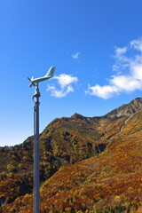 Fototapeta na wymiar 山にある風車