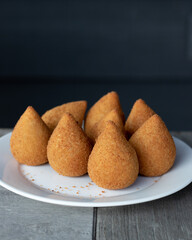 Coxinhas, brazilian snacks, finger food, tasty fried food made with chicken