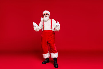 Fototapeta na wymiar Full length body size view of his he handsome cheerful cheery bearded Santa hipster dancing having fun celebratory festal occasion newyear isolated bright vivid shine vibrant red color background