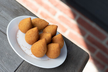 Coxinhas, brazilian snacks, finger food, tasty fried food made with chicken