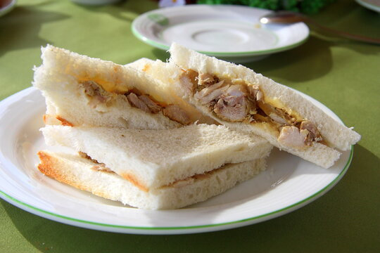 Chicken Sandwich. Plain Pieces Of Bread With Boiled Chicken.