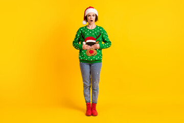 Full size photo astonished frustrated girl in santa claus headwear dislike theme x-mas christmas...